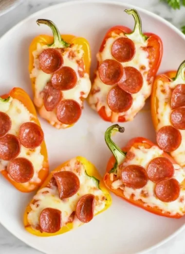 Colorful pizza stuffed mini peppers filled with cheese and toppings