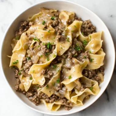 Bowl of hearty beef noodles with tender beef and vegetables