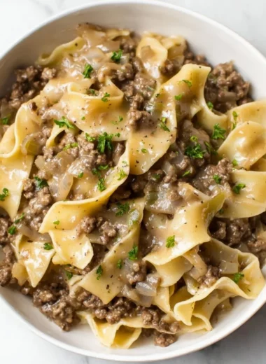Bowl of hearty beef noodles with tender beef and vegetables