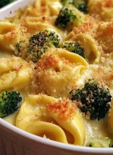 Creamy cheesy tortellini bake with broccoli in a baking dish