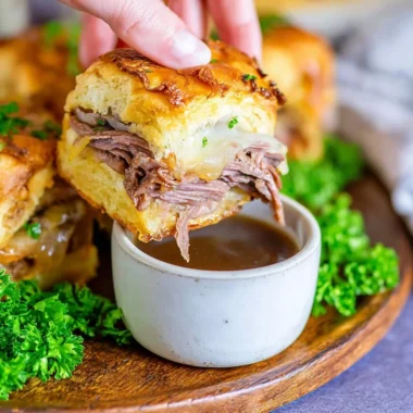 French Dip Sliders served with au jus for dipping