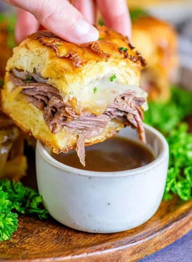 French Dip Sliders served with au jus for dipping
