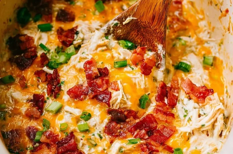 Delicious slow cooker crack chicken served in a bowl with herbs
