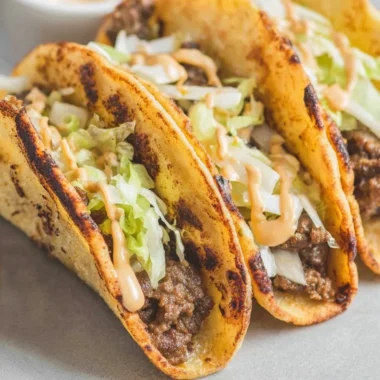 Delicious smash burger tacos with juicy beef patty and fresh toppings