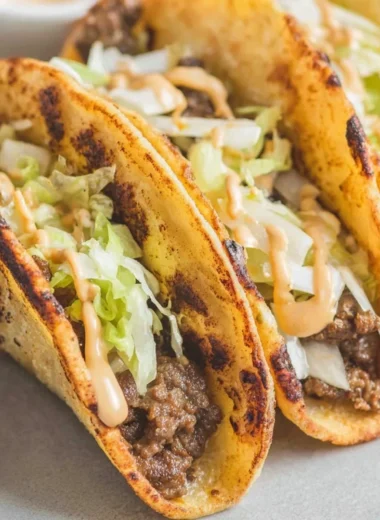Delicious smash burger tacos with juicy beef patty and fresh toppings