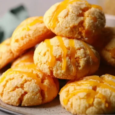 Freshly baked tropical mango cookies on a cooling rack