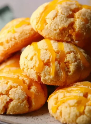 Freshly baked tropical mango cookies on a cooling rack