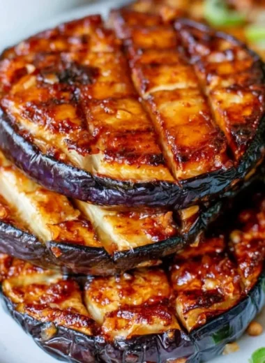Crispy air fryer eggplant slices on a plate