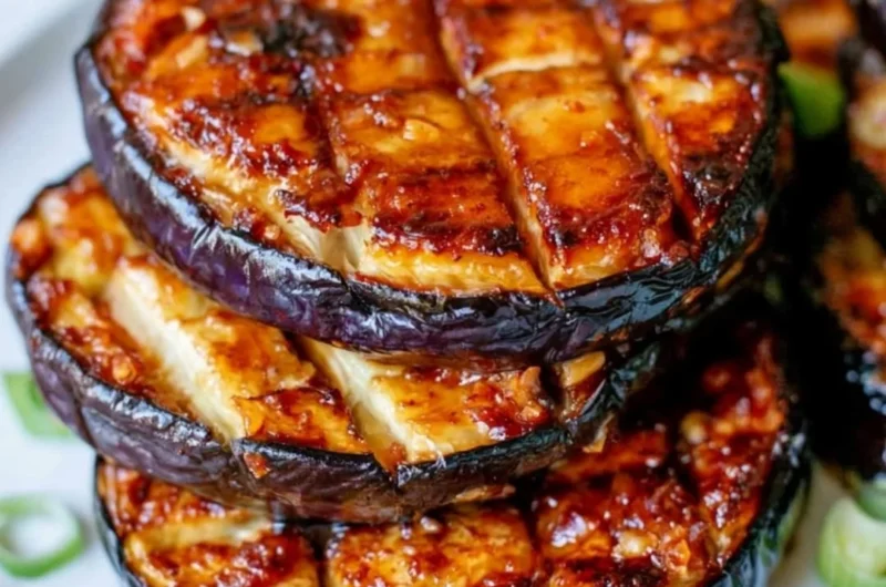 Crispy air fryer eggplant slices on a plate