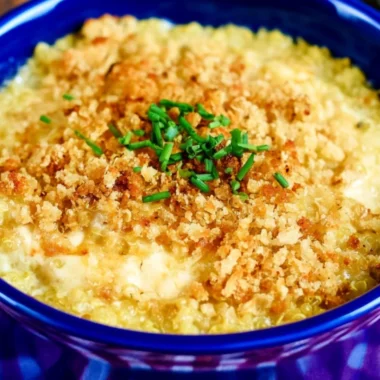 Creamy and cheesy quinoa mac and cheese ready to serve in a bowl