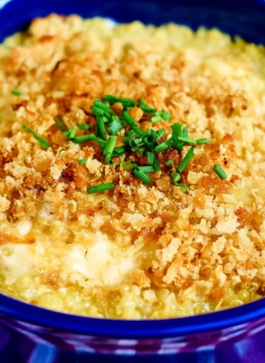 Creamy and cheesy quinoa mac and cheese ready to serve in a bowl