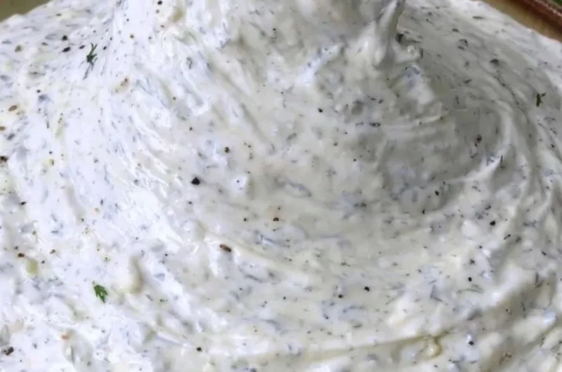 Delicious cucumber dip served with fresh vegetable sticks