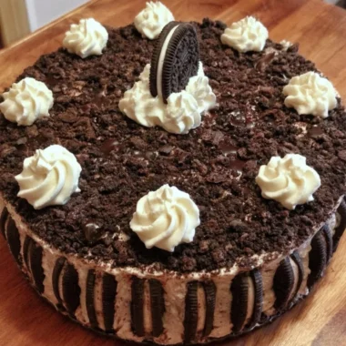 Oreo Easy Ice Cream Cake with chocolate and vanilla layers topping