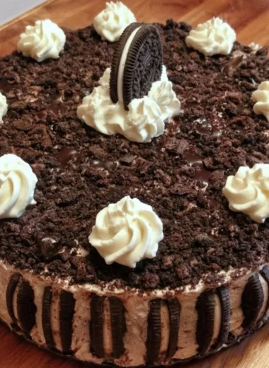 Oreo Easy Ice Cream Cake with chocolate and vanilla layers topping