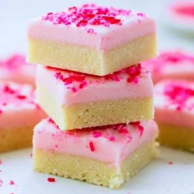 Deliciously baked Sugar Cookie Bars topped with colorful sprinkles