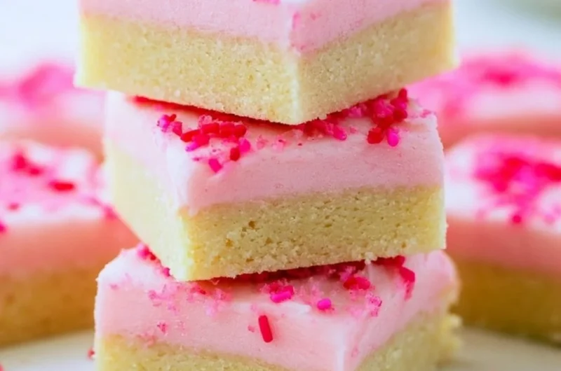 Deliciously baked Sugar Cookie Bars topped with colorful sprinkles
