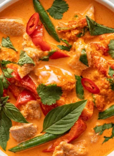 Bowl of cozy Thai red curry with chicken and vegetables