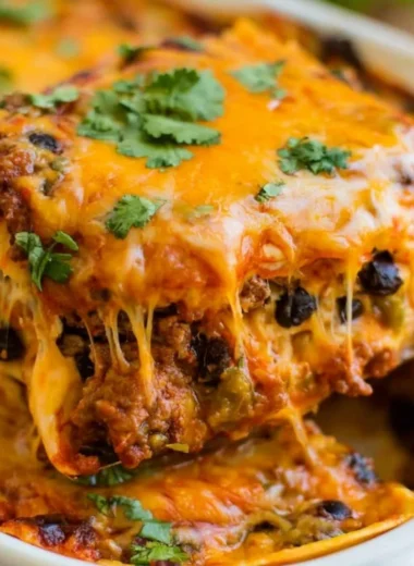 Cozy Beef Enchilada Casserole filled with savory beef, cheese, and tortillas.