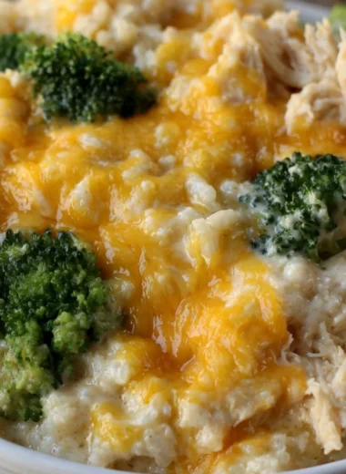 Cozy cheesy broccoli chicken and rice casserole baked to perfection