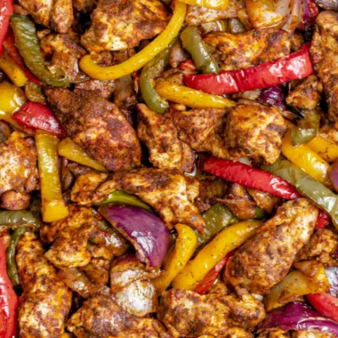 Delicious sheet pan chicken fajitas with colorful vegetables and spices