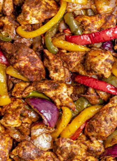 Delicious sheet pan chicken fajitas with colorful vegetables and spices