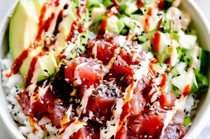 Cozy spicy tuna poke bowl with fresh ingredients and vibrant toppings