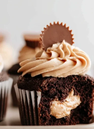 Delicious dark chocolate cupcakes with creamy peanut butter marshmallow fluff topping