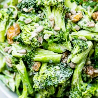 Freshly prepared simple broccoli slaw in a bowl with dressing