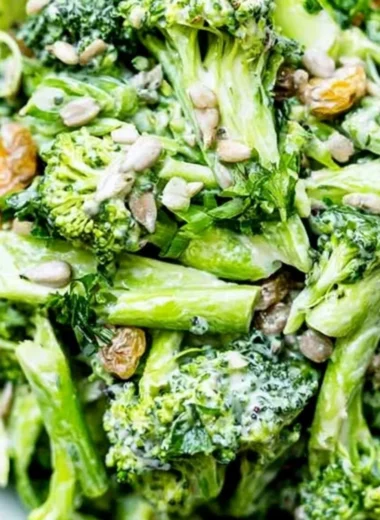 Freshly prepared simple broccoli slaw in a bowl with dressing