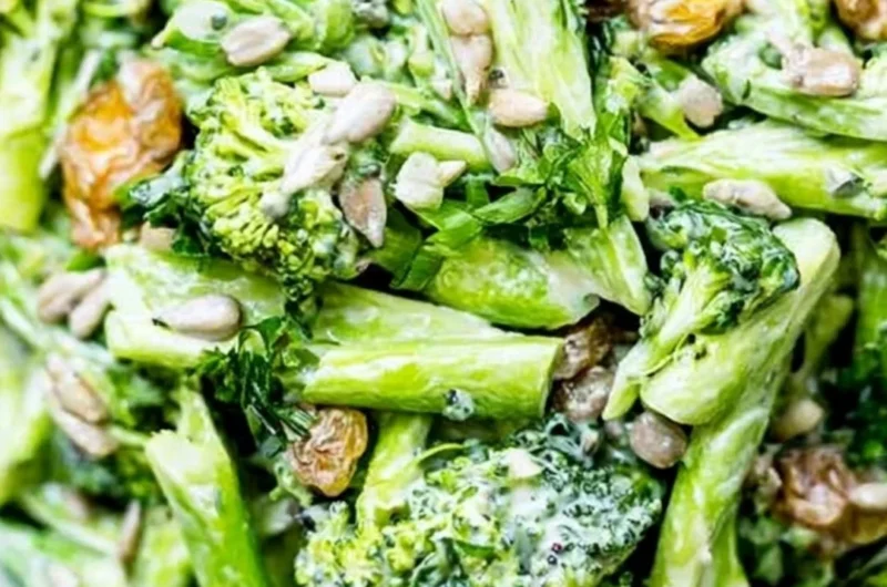 Freshly prepared simple broccoli slaw in a bowl with dressing