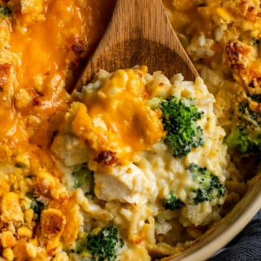 Broccoli Cheddar Chicken Casserole with rice in a baking dish