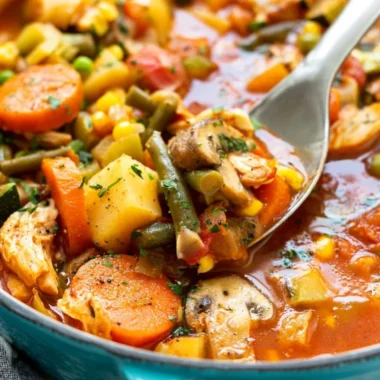 Delicious homemade Chicken Vegetable Soup with fresh vegetables and chicken pieces