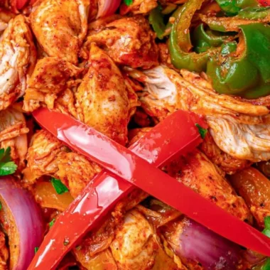 Delicious crockpot chicken fajitas served with peppers and onions