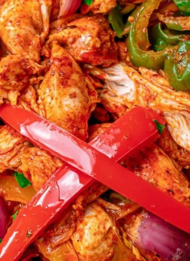Delicious crockpot chicken fajitas served with peppers and onions