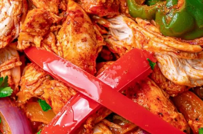 Delicious crockpot chicken fajitas served with peppers and onions