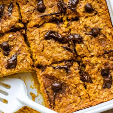 Delicious pumpkin baked oatmeal with chocolate chips, perfect for fall breakfasts.