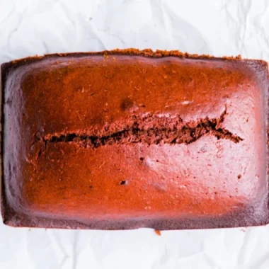 Delicious homemade gingerbread cake loaf on a festive table setting