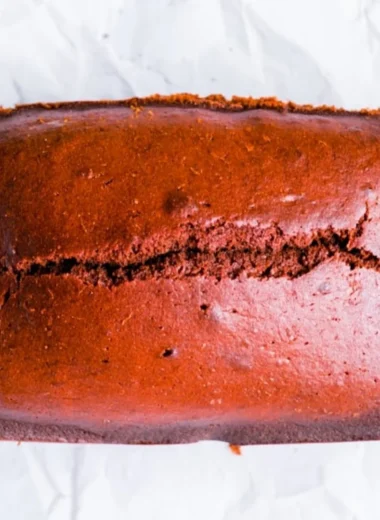 Delicious homemade gingerbread cake loaf on a festive table setting